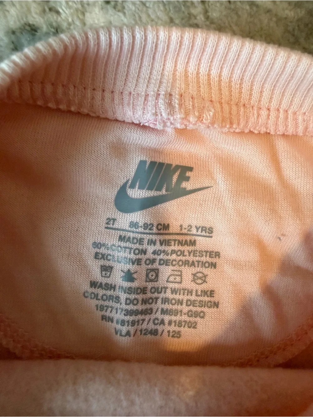Nike Peach Crewneck Sweatshirt with Black Swoosh + Black Patterned Skirt